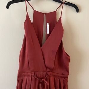 Lush maroon jumpsuit.  Cute neckline - Soft and flowy wide leg.  Size large